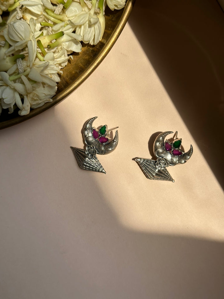 Chand Crescent Silver Oxidised Earrings with Floral Accents