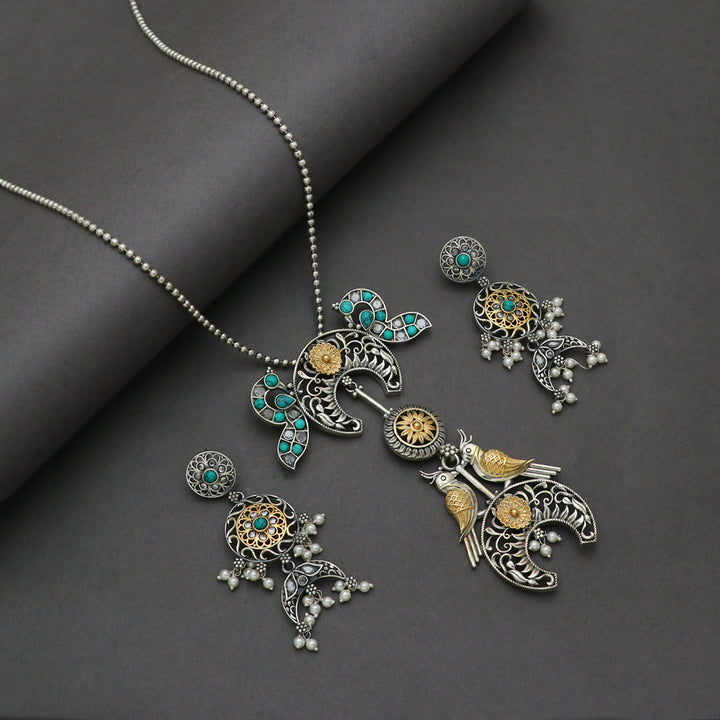 Silver Dual Tone Parrot pendant and earring set