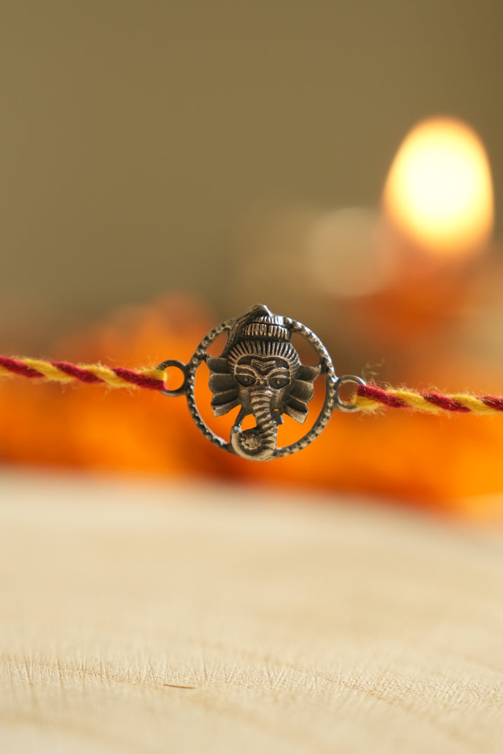 silver ganesh rakhi 