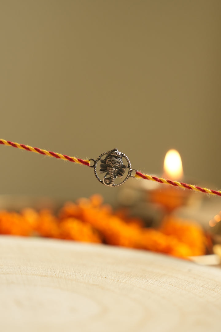 silver ganesh rakhi 