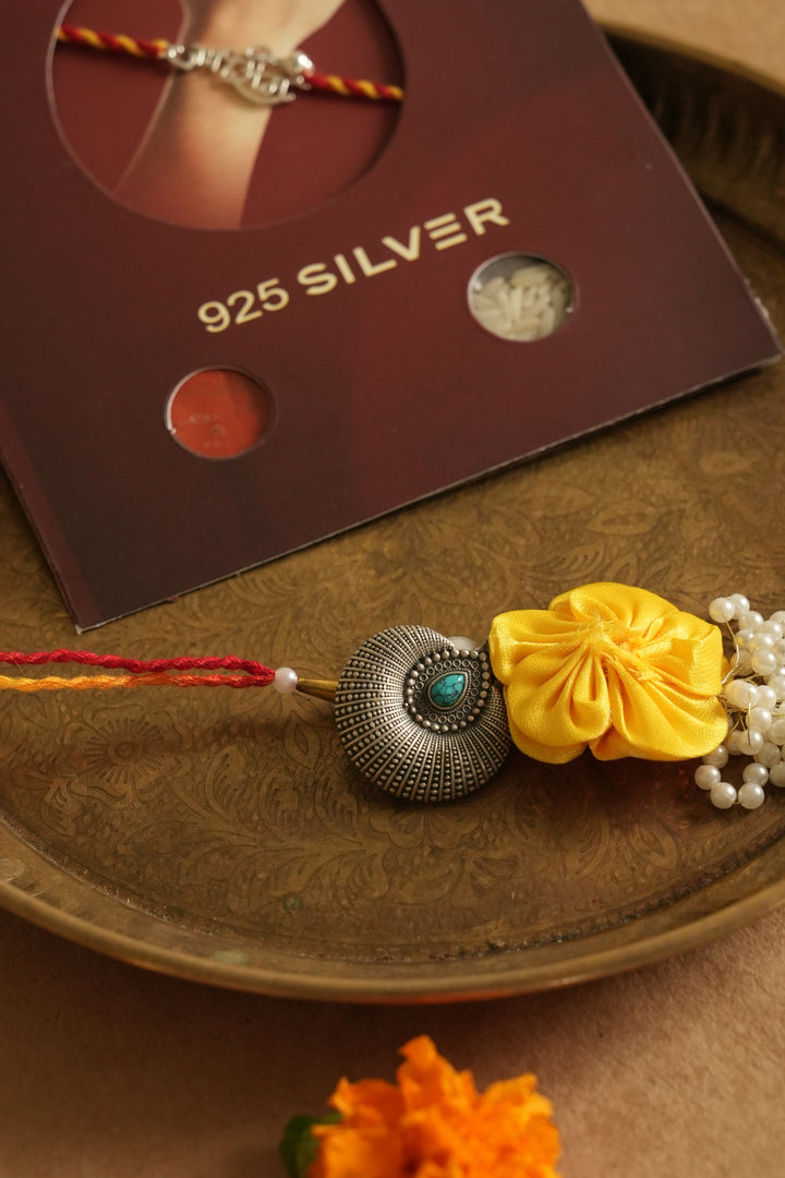silver lumba rakhi 