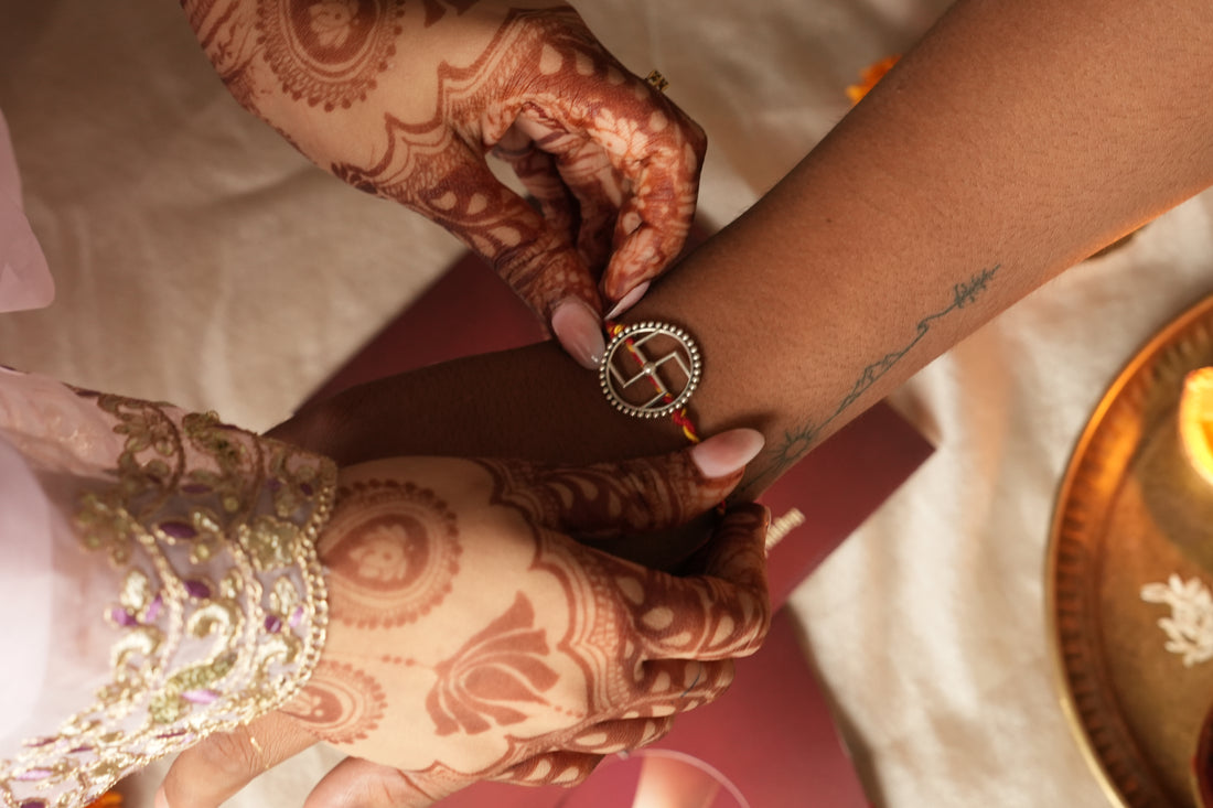 silver swastik rakhi 