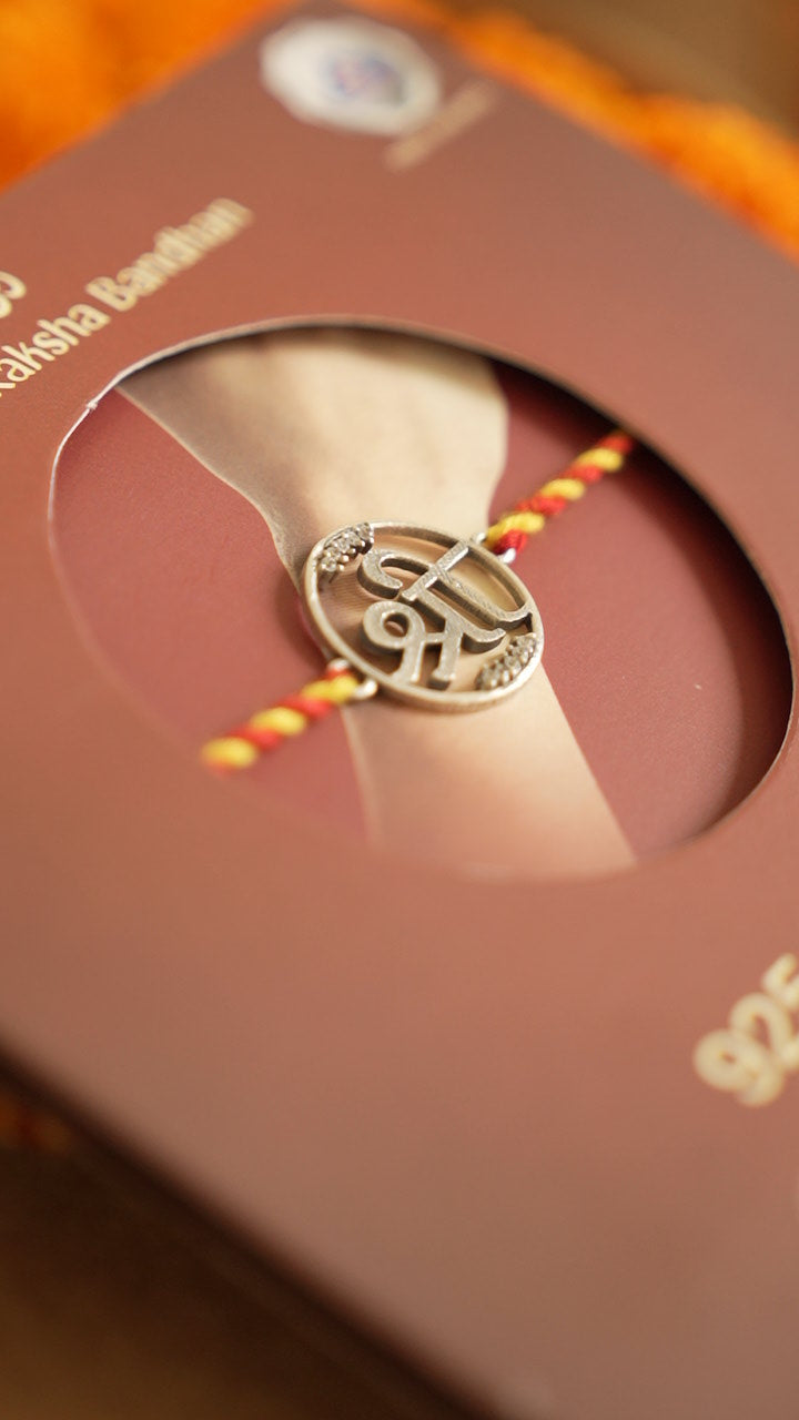 silver shree rakhi