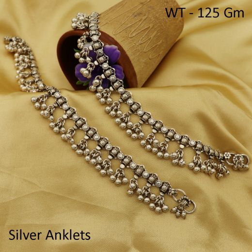 Traditional silver anklets with silver bells