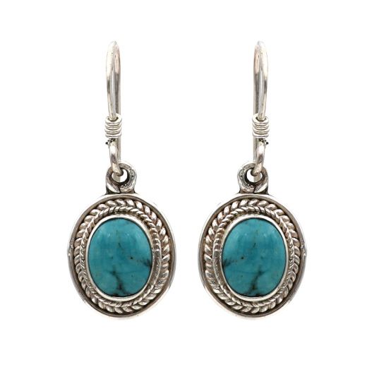Antique Shape Sterling Silver With Blue Stone.