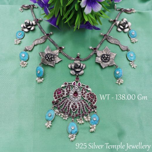 Antique Dual Tone Oxidized Peacock And Floral Design With Blue Stone Silver Necklace.